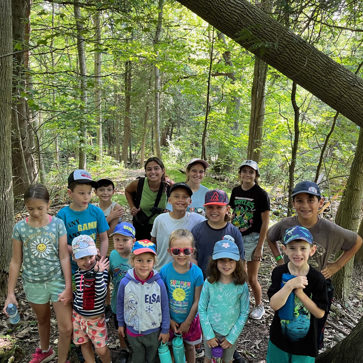 Acorn camp kids posing for picture along trail