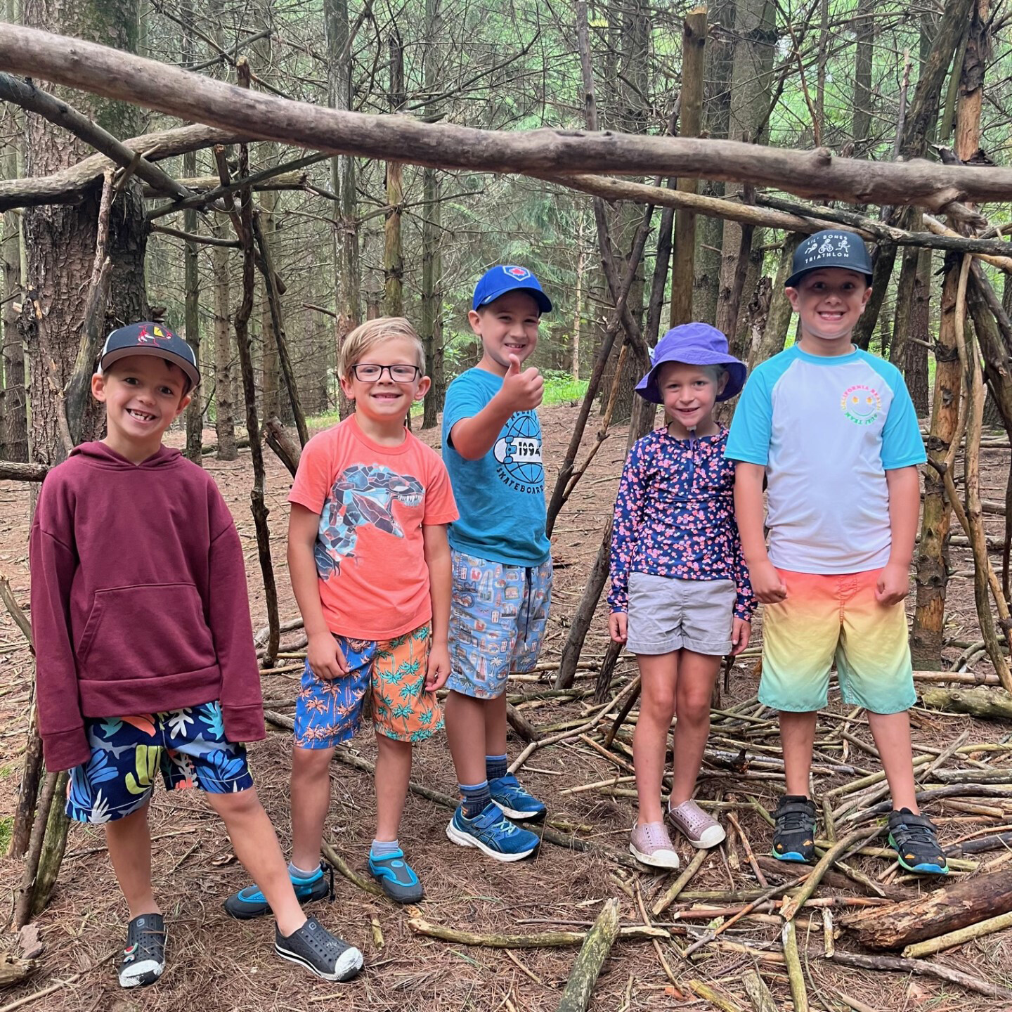 Acorn camp kids in woods